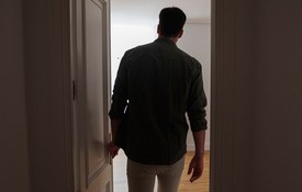 Shadowy figure lurking inside a home